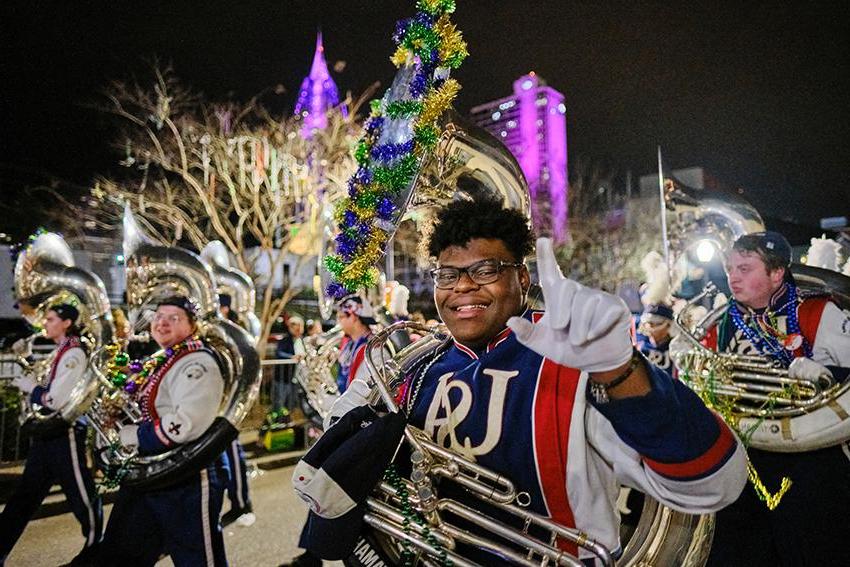 Jaguar Marching Band smiling with their J's up